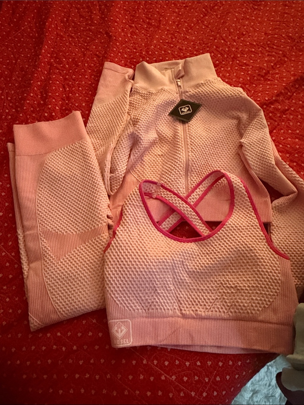 Seamless Textured Pink Cross-Back Sports Bra